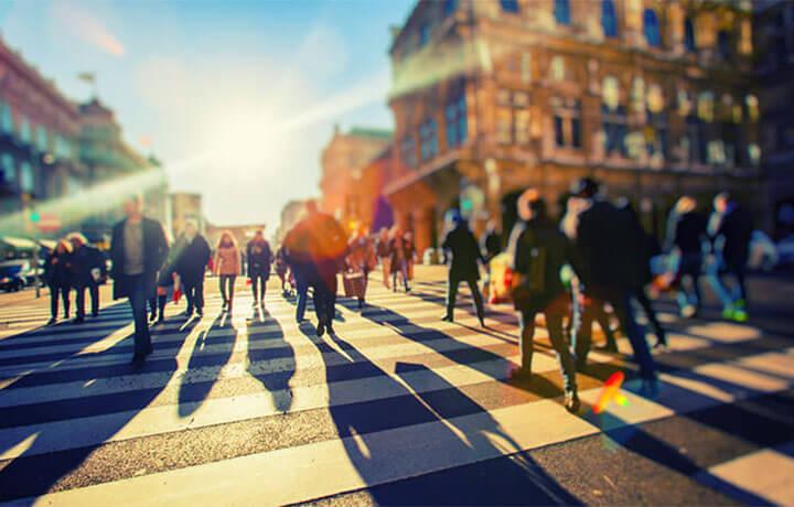 people crossing local government city homepage card