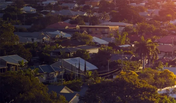 Suburb with powerlines winding through